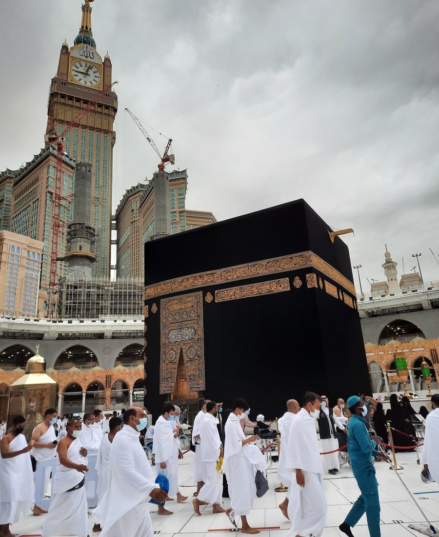 Pilgrims in white garments circling the Kaaba